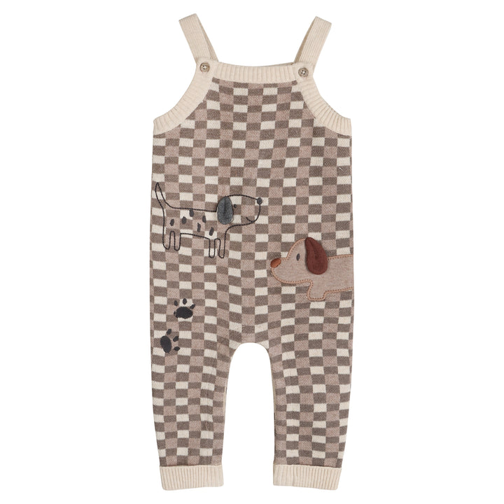 Brown checkered knit baby overalls with cream trim and paw print details