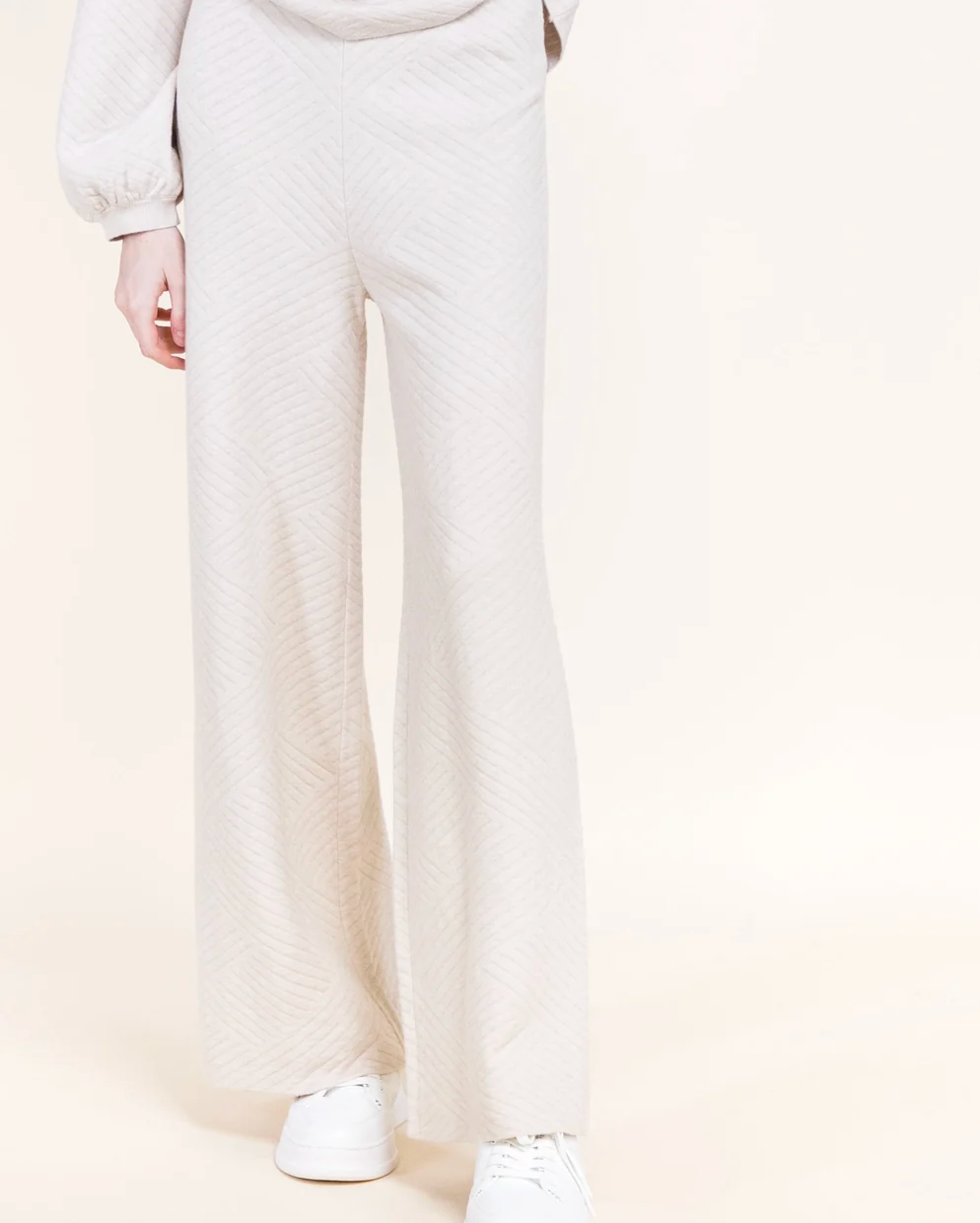 Chevron knit wide leg pant by Original, available in black and beige