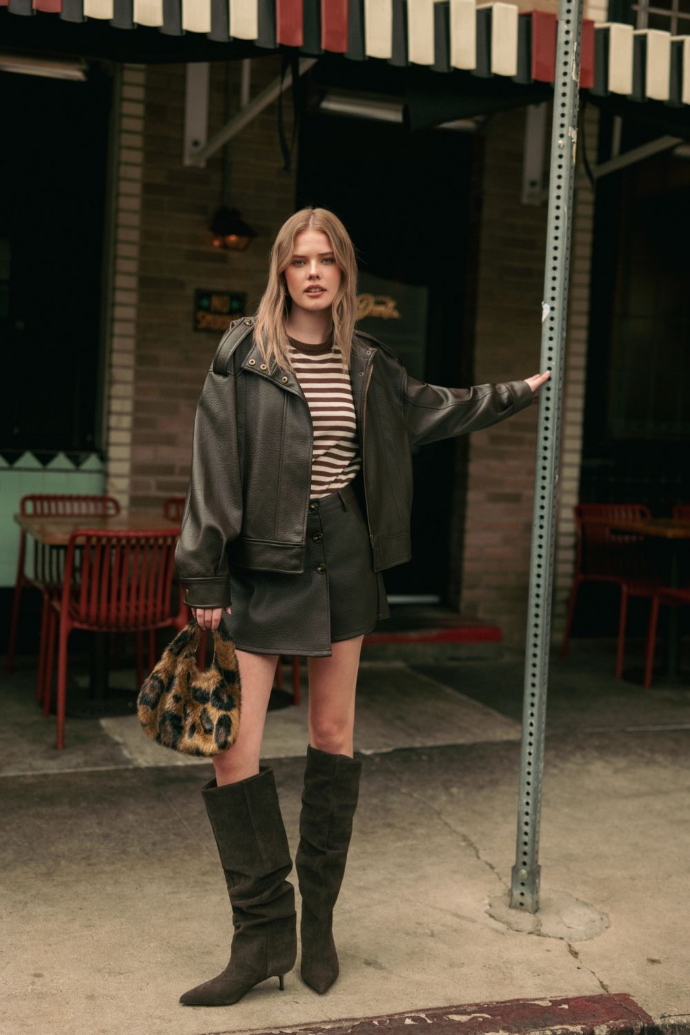 Chocolate Faux Leather Jacket in chocolate brown, full-length lifestyle view with tall boots