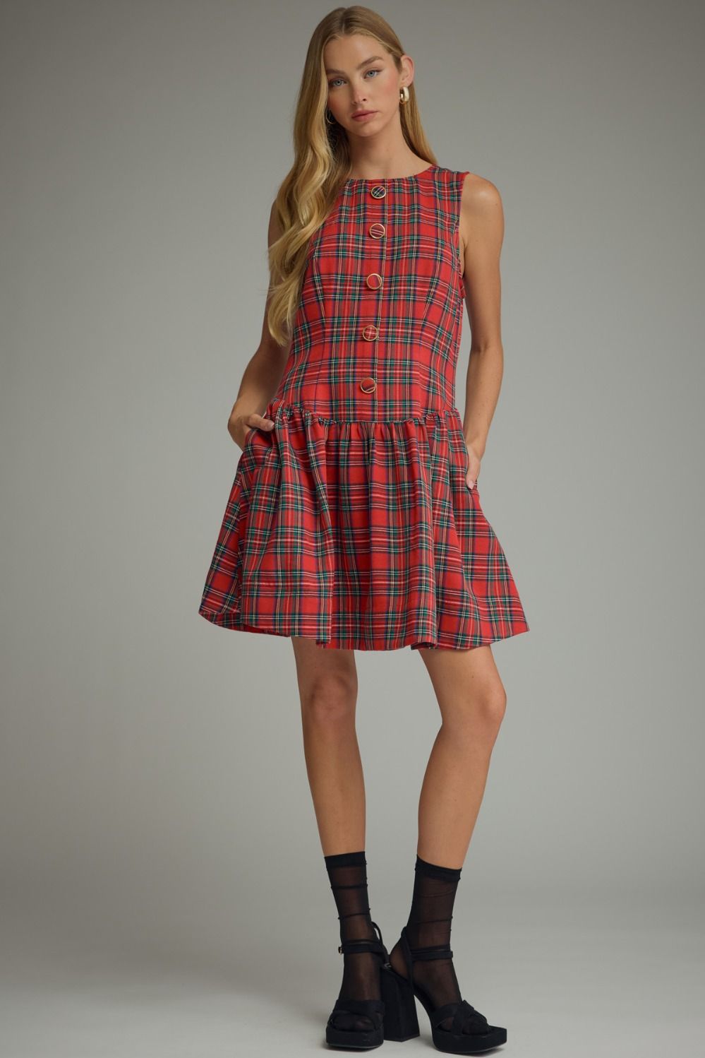 Tartan Belle Sleeveless Dress in red tartan, full-length view styled with sheer socks and platform heels