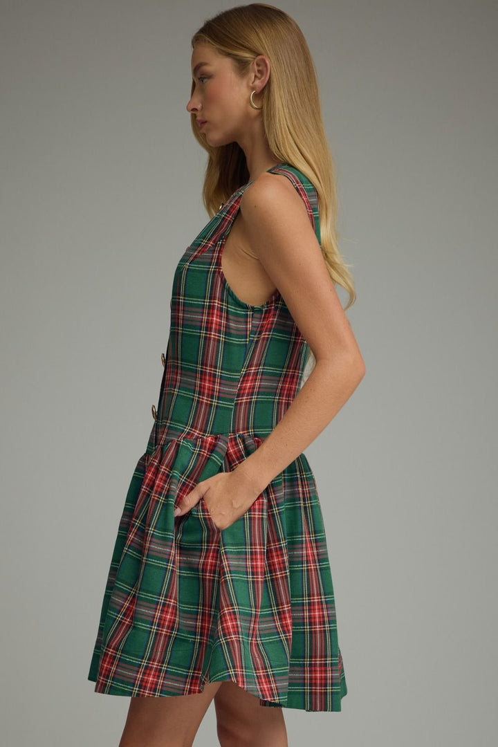 Tartan Belle Sleeveless Dress in green tartan, side view showing pocket