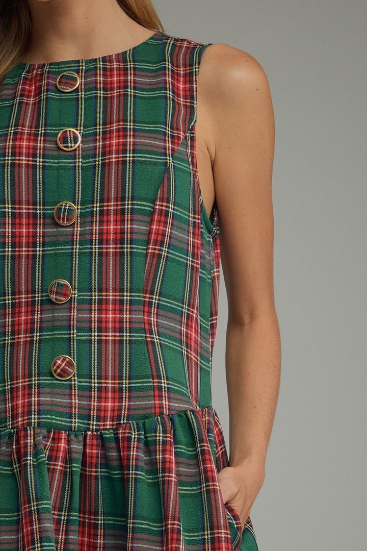 Tartan Belle Sleeveless Dress in green tartan, close-up of button front and drop waist
