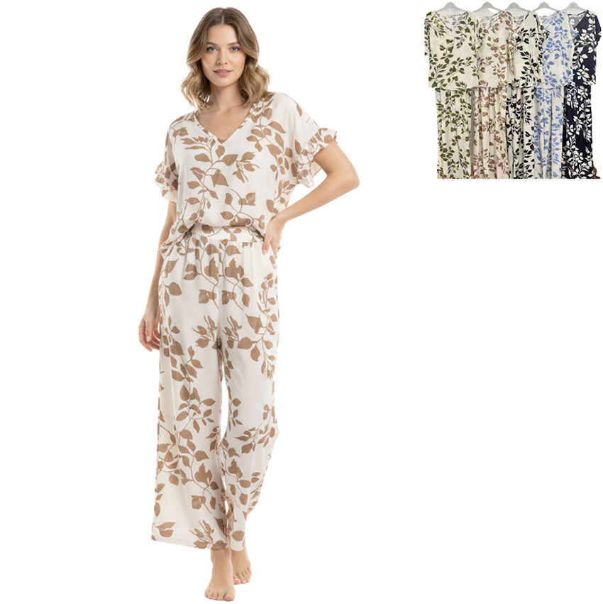 Woman wearing a floral pajama set with inset images of different color options.