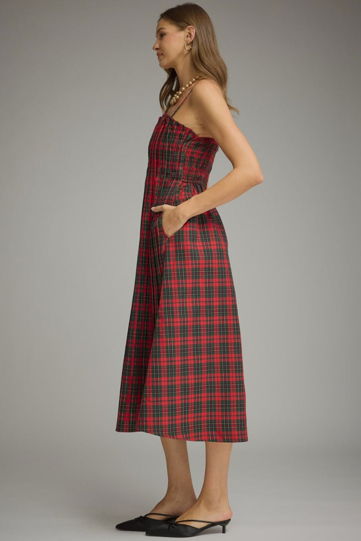 Holly Plaid Pleated Midi Dress in red plaid, side view showing pocket