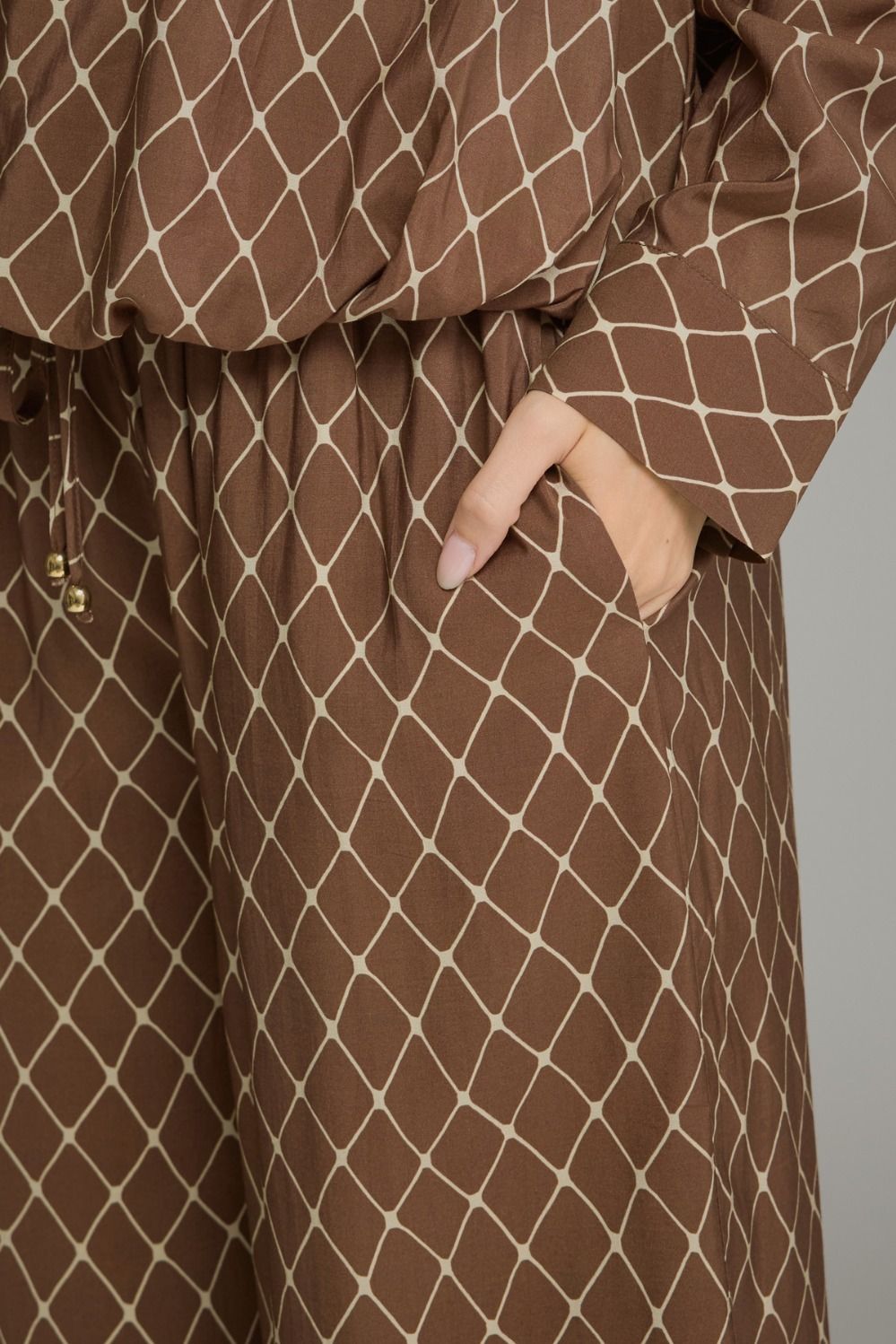 Lattice Wide Leg Pant in brown lattice print, close-up of drawstring waist and pocket