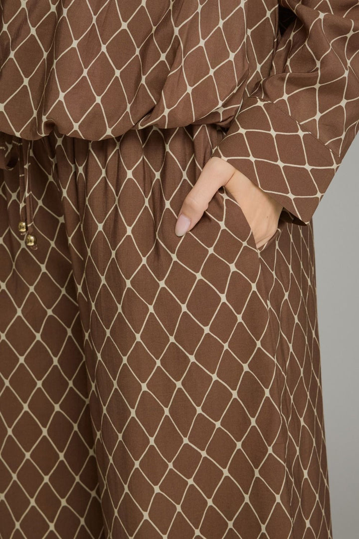 Lattice Wide Leg Pant in brown lattice print, close-up of drawstring waist and pocket