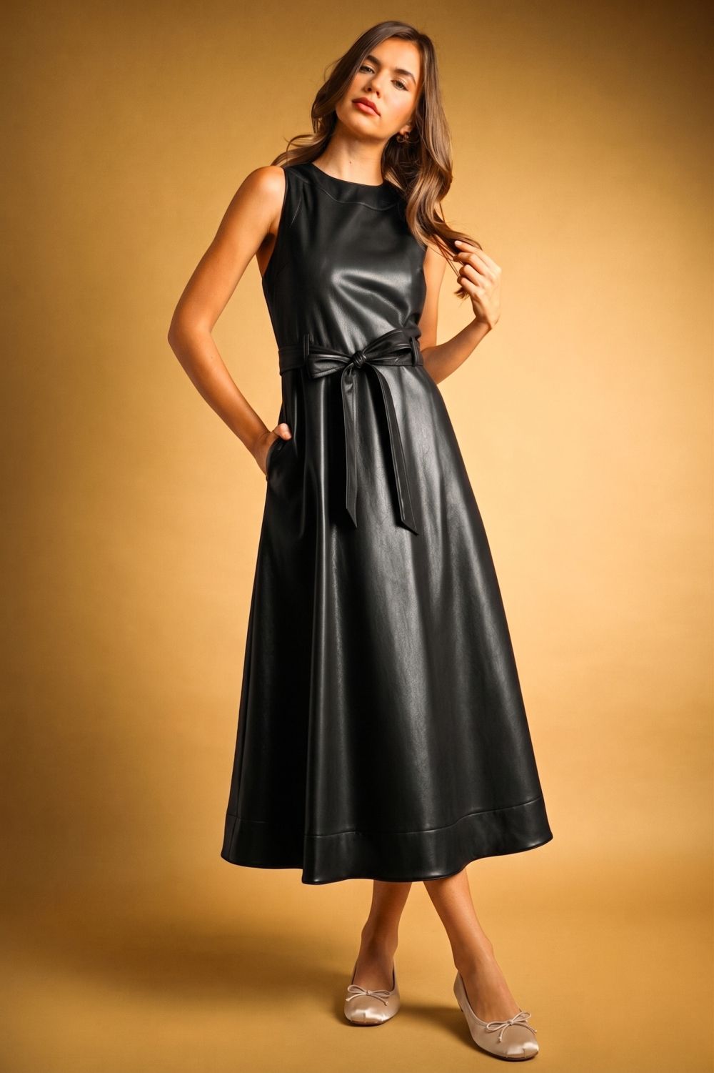 Laurel Belted Faux Leather Dress in black, front view