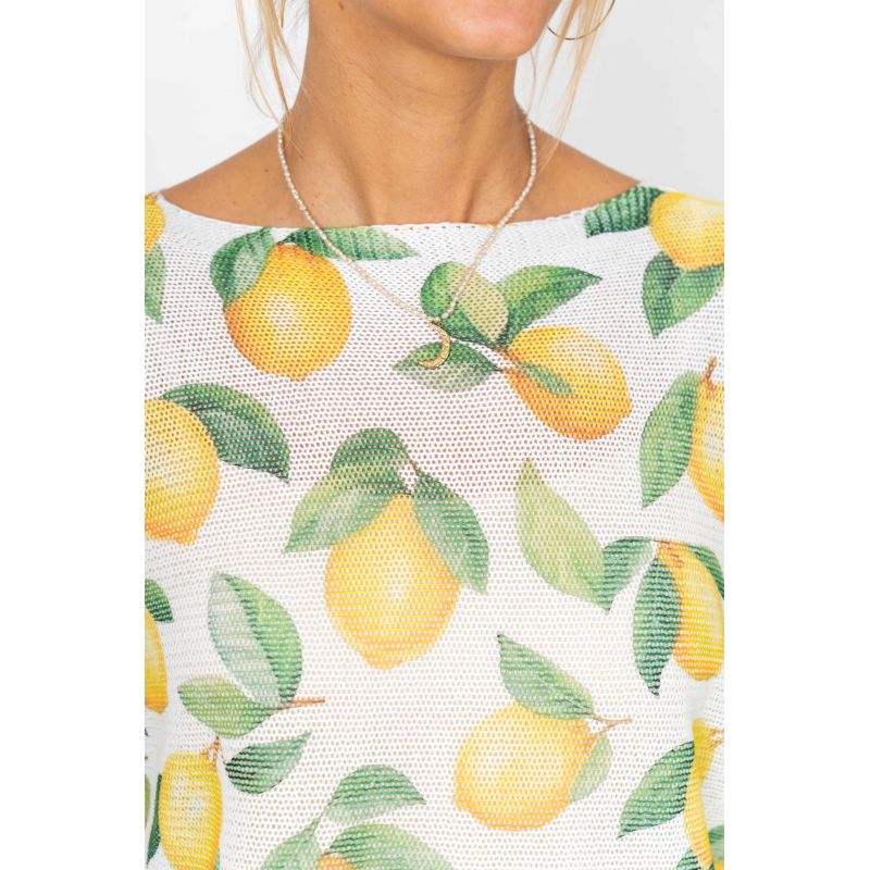 Woman wearing a top with lemon pattern
