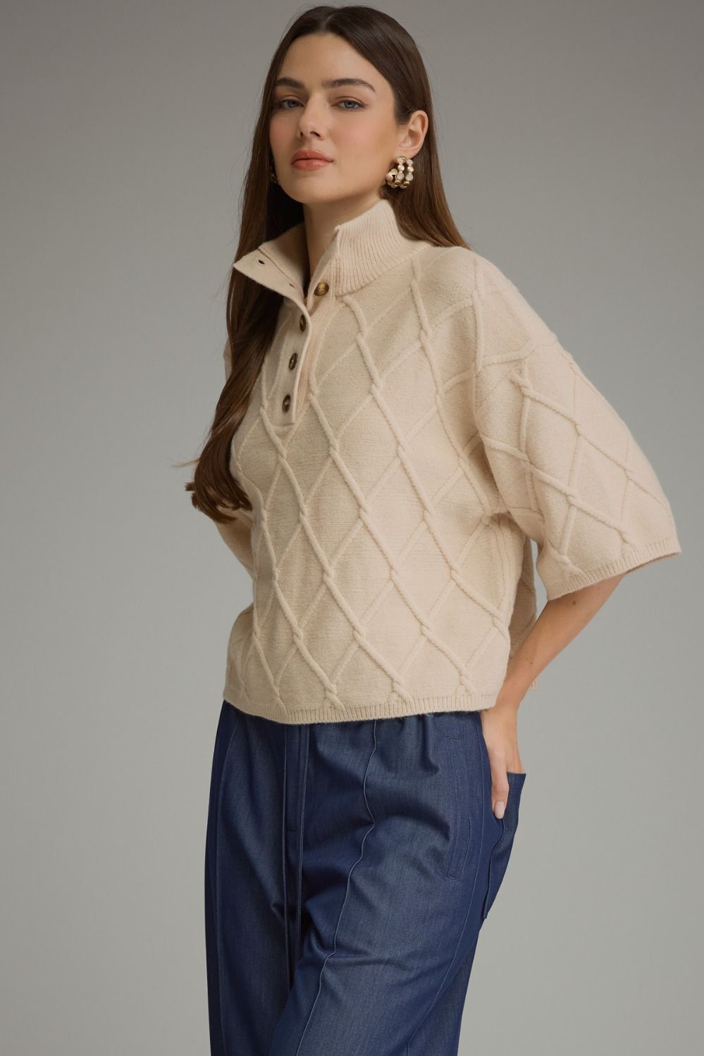 Liesel Cable Sweater in ecru, three-quarter front view