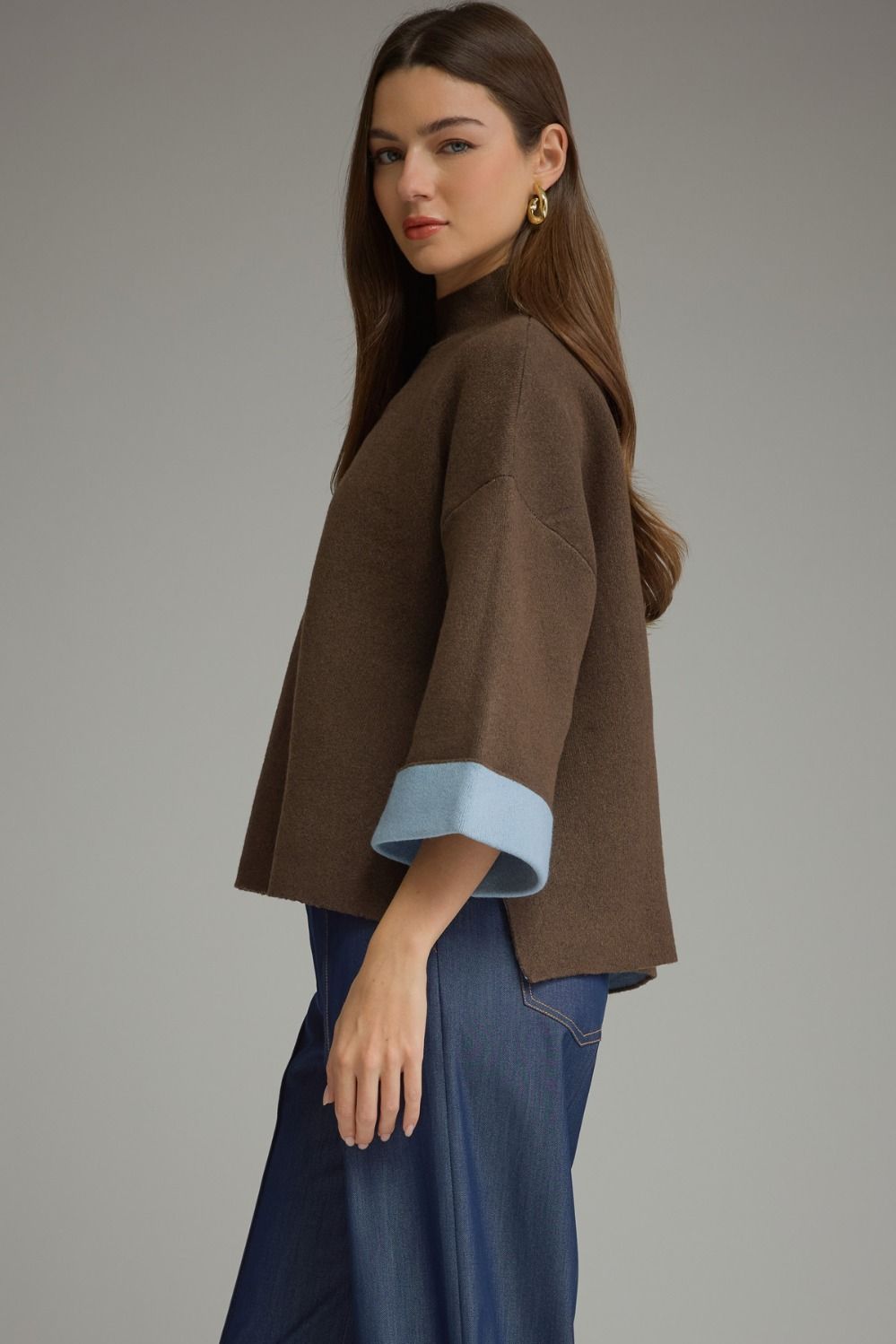 Mochaccino Mock Neck Sweater in brown, side view showing side slit