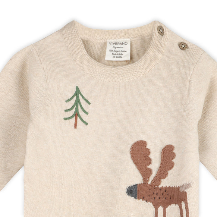 Moose appliqué and embroidered evergreen tree detail on oatmeal baby knit jumpsuit