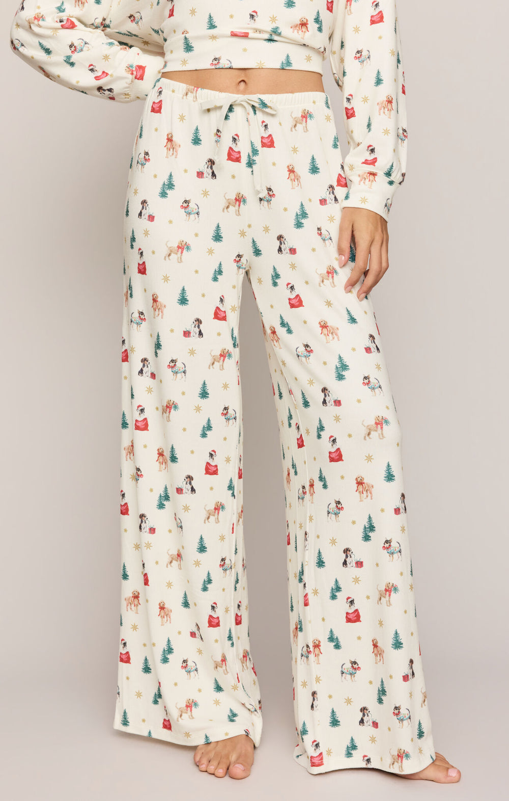 Front view of the Pawfect wide-leg pajama pant with drawcord waist and holiday dog print