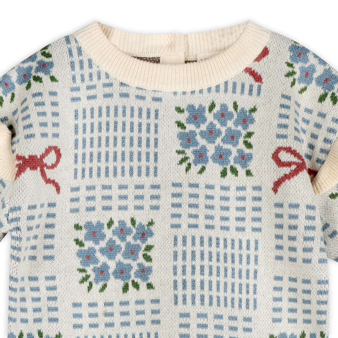 Blue floral and red bow jacquard knit detail on the Ribbon &amp; Bow Baby Sweater
