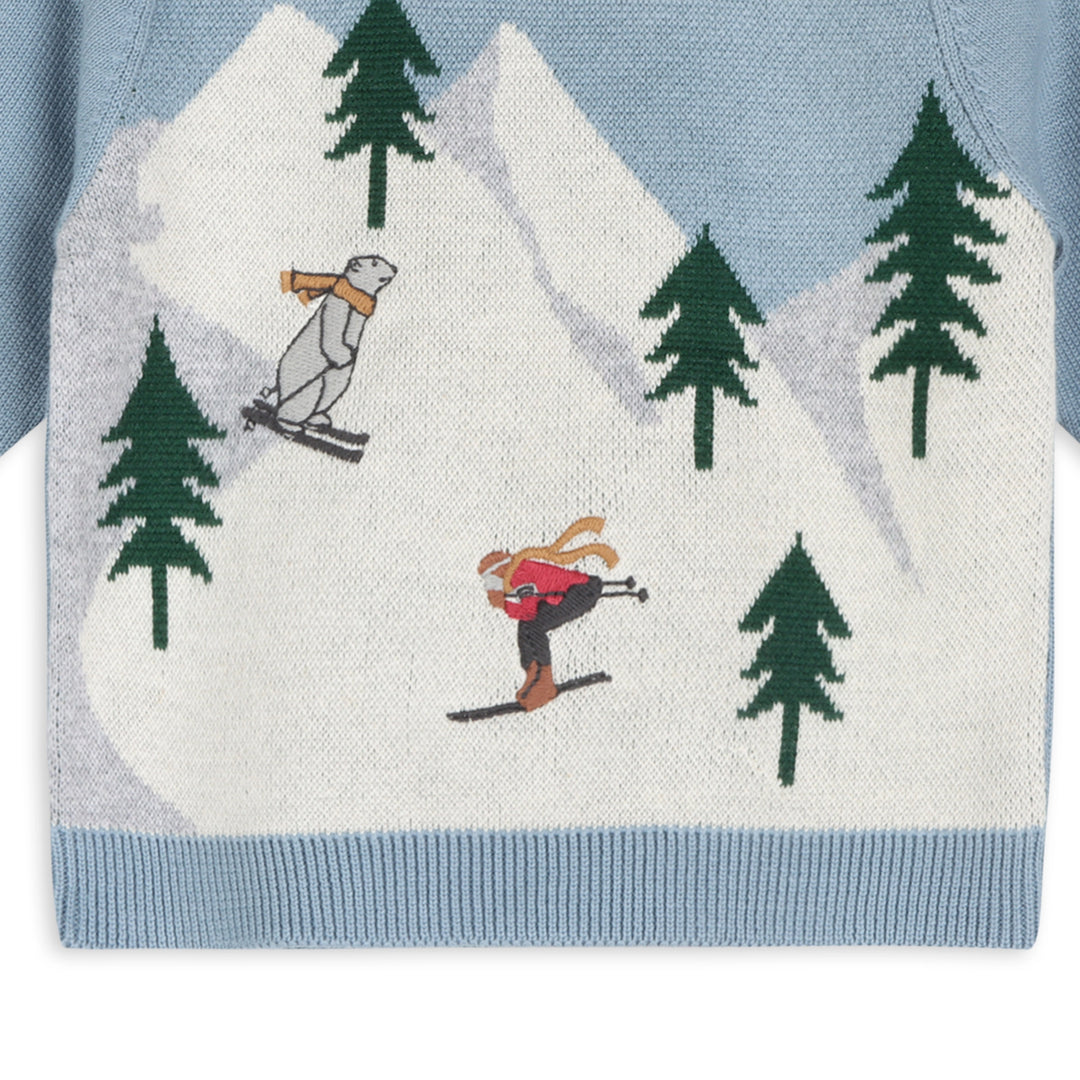 Organic cotton ski scene baby sweater and tree-print pant set by Viverano