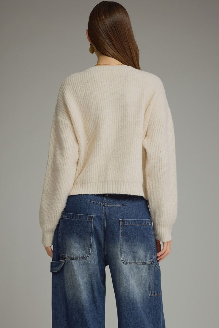 Tied Up in Tartan Bow Cardigan in cream, back view