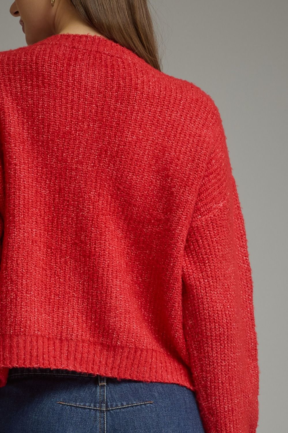 Tied Up in Tartan Bow Cardigan in red, close-up of knit texture, back view
