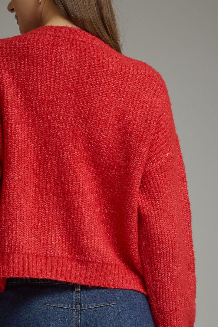 Tied Up in Tartan Bow Cardigan in red, close-up of knit texture, back view