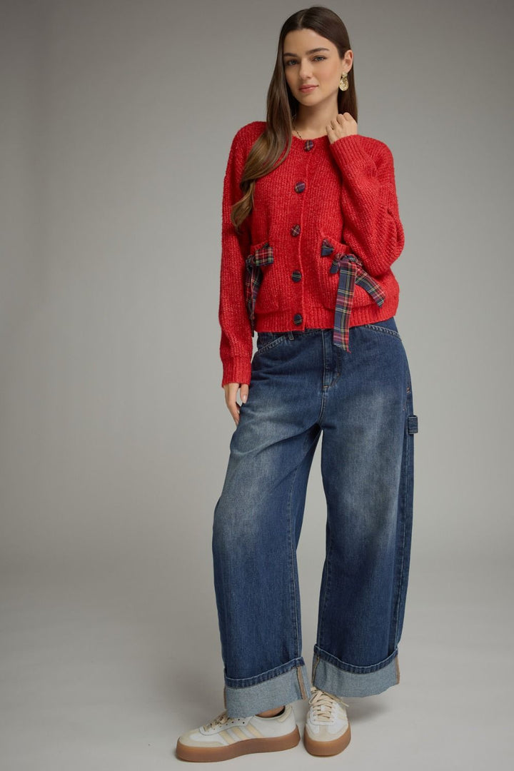 Tied Up in Tartan Bow Cardigan in red, full-length view styled with wide-leg jeans