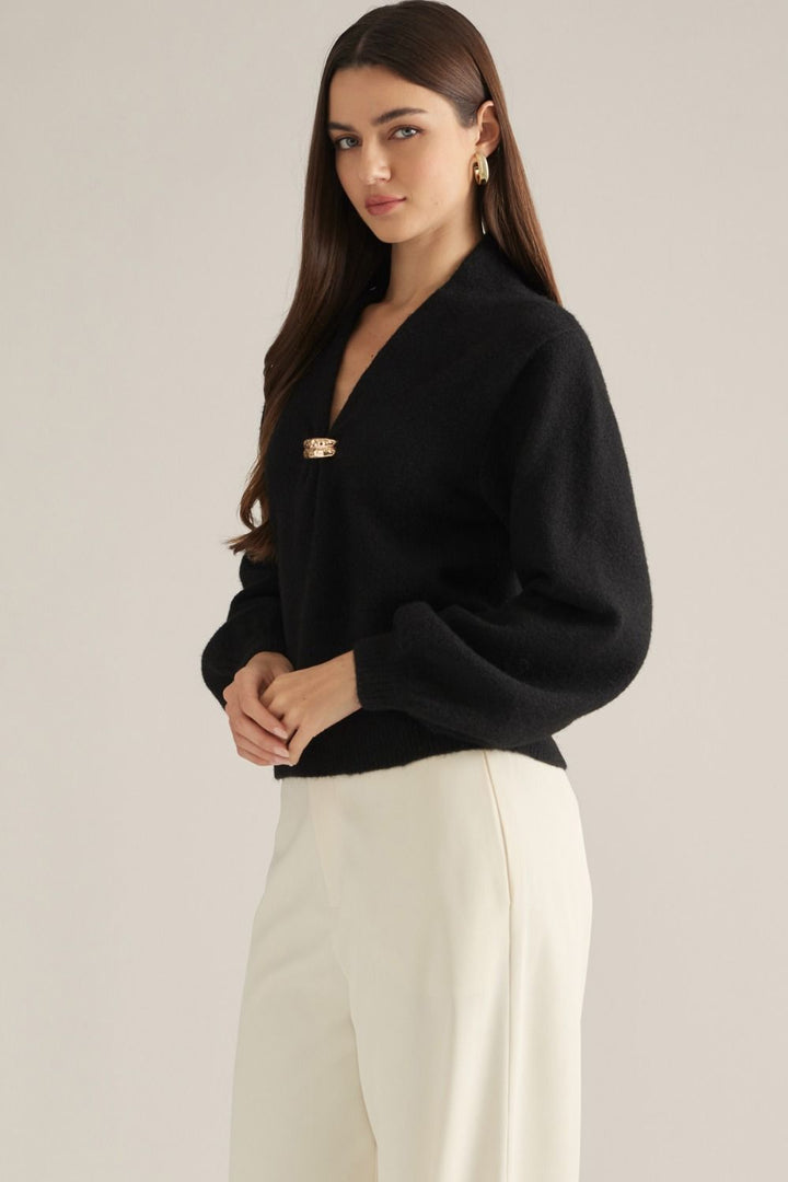 Vivienne Gold Clasp Collared Sweater in black, three-quarter front view