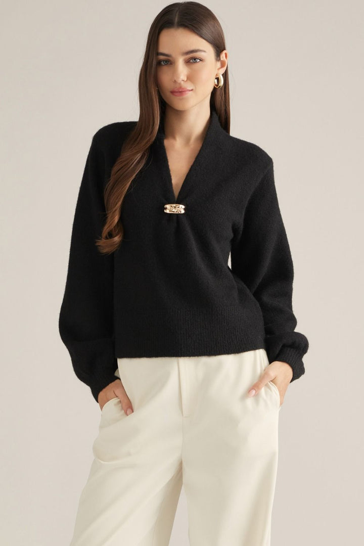 Vivienne Gold Clasp Collared Sweater in black with gold clasp V-neckline, front view