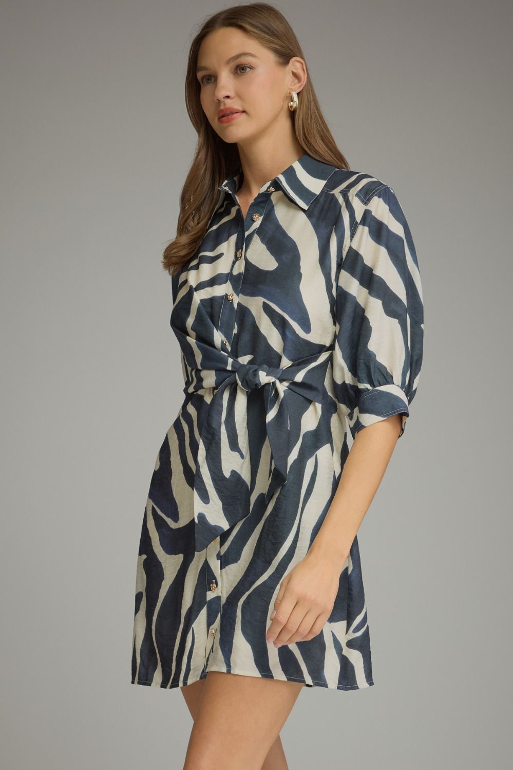 Zuri Tie-Waist Shirt Dress in navy and cream print, three-quarter front view