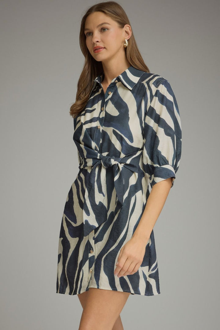 Zuri Tie-Waist Shirt Dress in navy and cream print, three-quarter front view